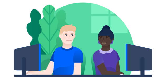 Two people working at a desk