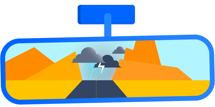 A rearview mirror illustration with a thunderstorm reflected in it.