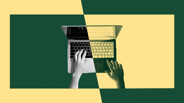 A bird's-eye view of a laptop split diagonally into two contrasting color fields — one dark green, one warm yellow — with two hands, one grayscale and one gold-toned, reaching toward the keyboard from opposite sides.